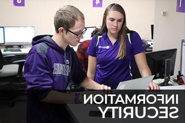 student getting assistance at the Help Desk